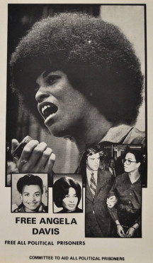 The most reproduced photograph of Angela Davis holding a microphone at a rally in 1970 via flashbak.com